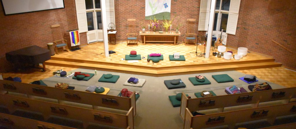 Meditation cushions set up in the sanctuary.